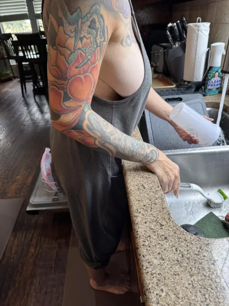 Dish Duty Delight: Side Boob & Suds, Oh My!
