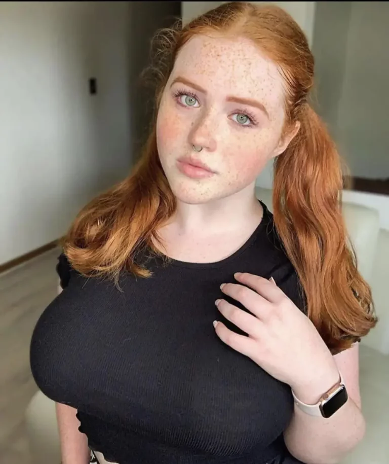 Freckled Redhead's Boobs About to Burst Out - You Want the Sauce?